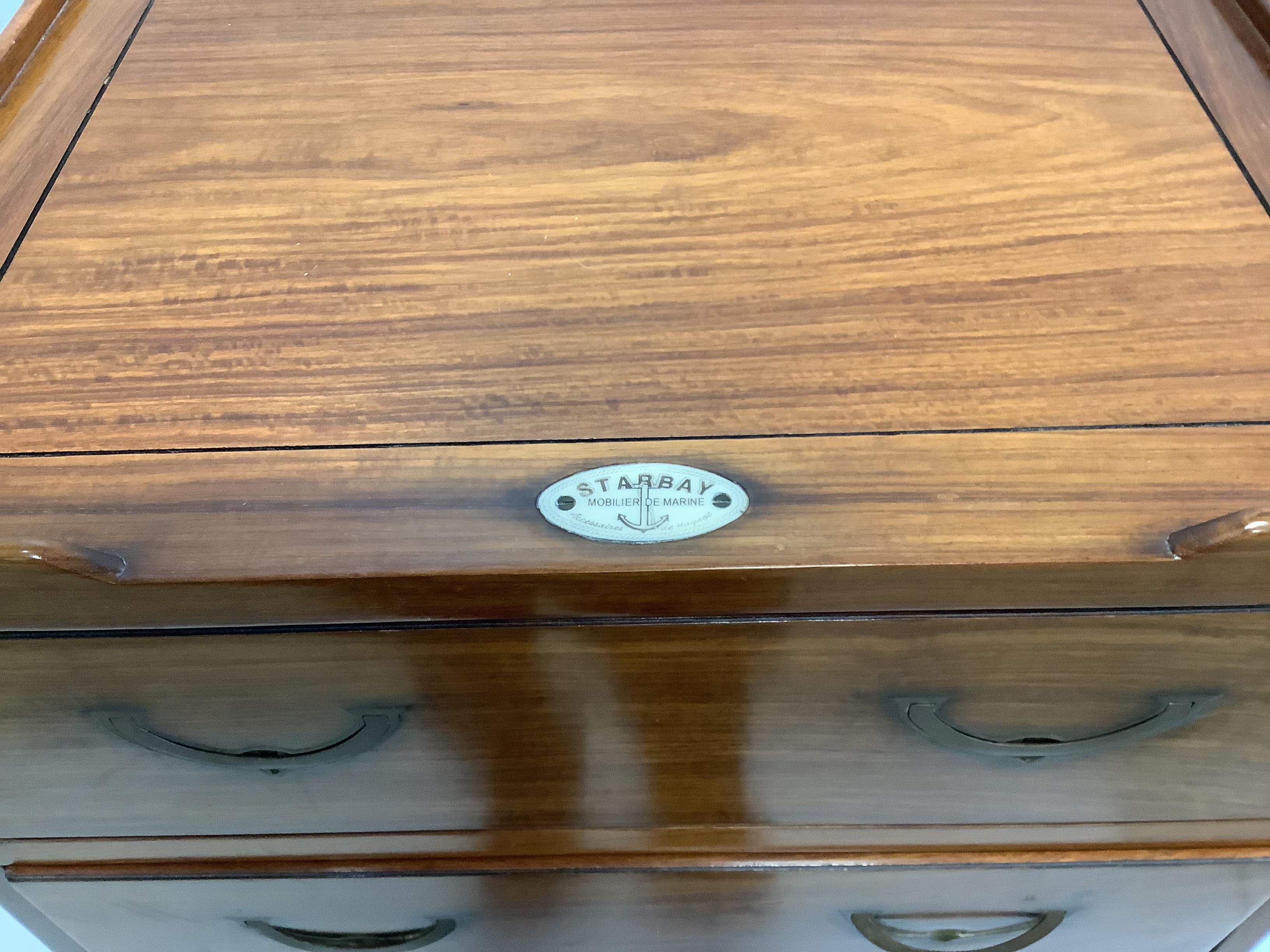 A reproduction 'Starbay' eight drawer narrow secretaire chest, width 55cm, depth 40cm, height 126cm